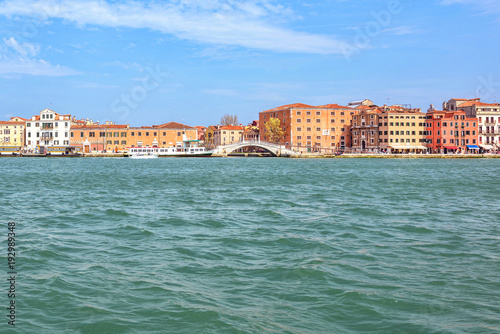 Daylight view to tourist boat cruising near Riva degli Schiavoni waterfront