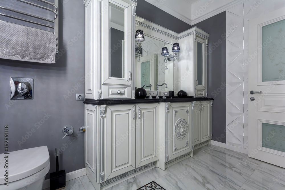 Classic bathroom with minimalistic white and gray interior design Classic bathroom with minimalistic white and gray interior design