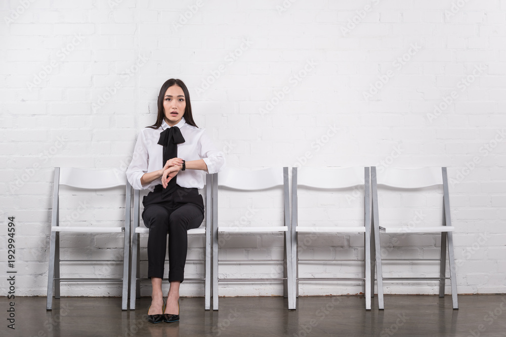 shocked asian businesswoman waiting for job interview shocked asian businesswoman waiting for job interview