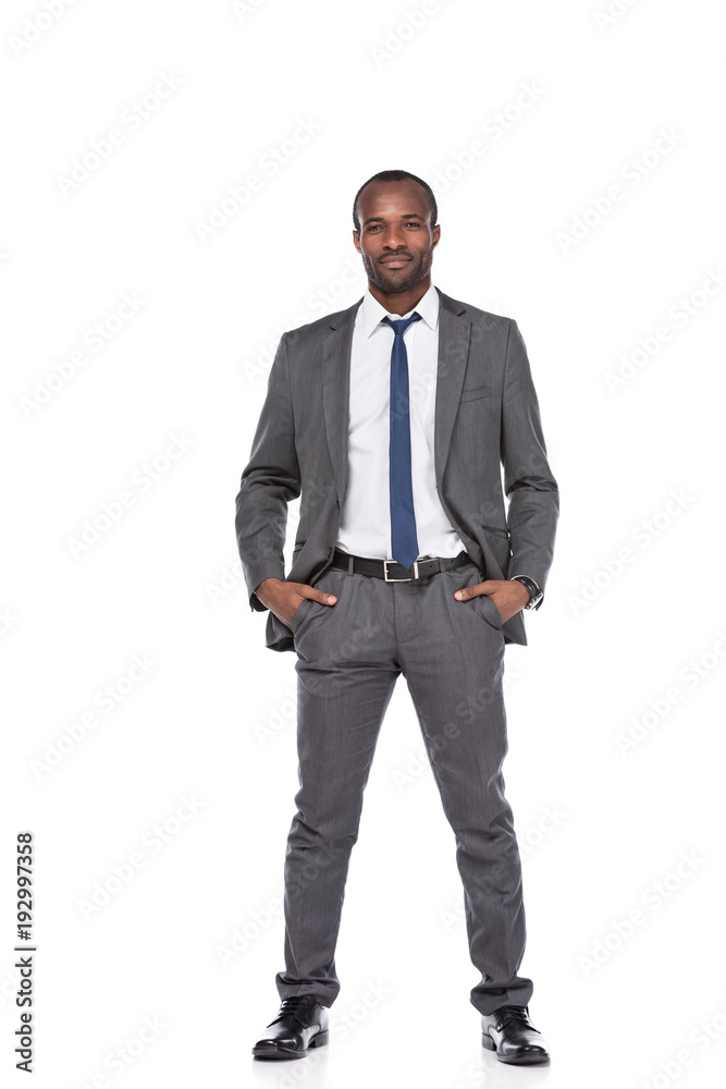 smiling african american businessman in suit isolated on white smiling african american businessman in suit isolated on white