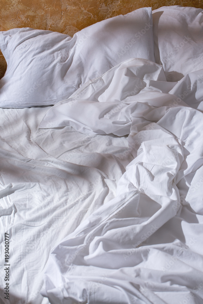 Crumpled bed linen