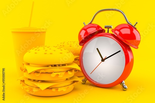 Fast food background with alarm clock