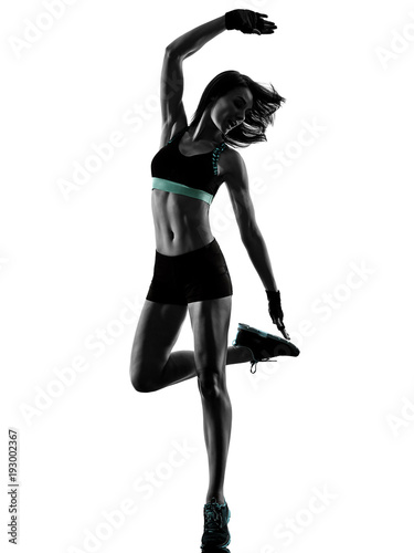 one caucasian woman exercising cardio boxing cross core workout fitness exercise aerobics silhouette isolated on white background photo