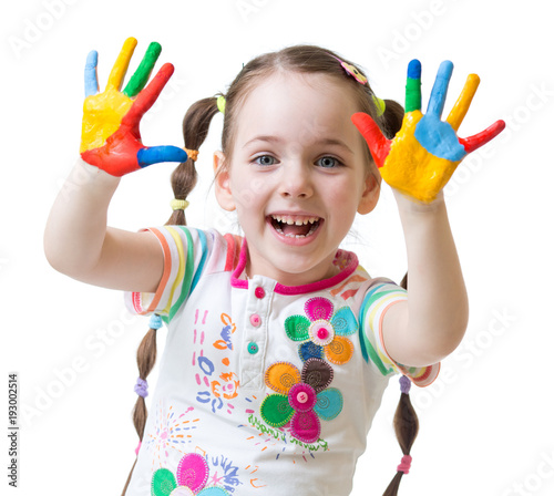 cute child girl have fun painting her hands isolated on white