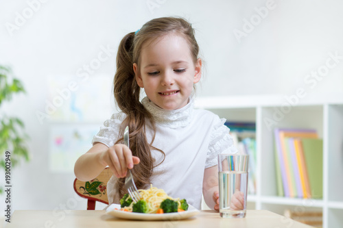 Funny little girl has a lun...