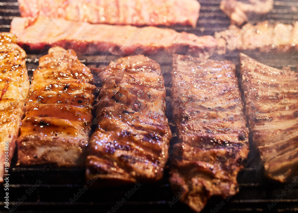 Close up of pork grilled on stove.Selective focus Close up of pork grilled on stove.Selective focus