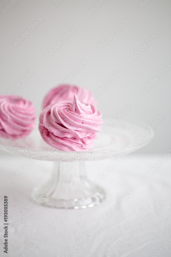 Homemade pink zephyr or marshmallow on white background