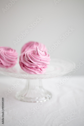 Homemade pink zephyr or marshmallow on white background