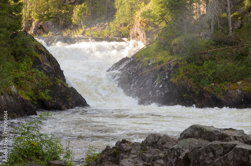 Waterfall in northern Finland in summer.