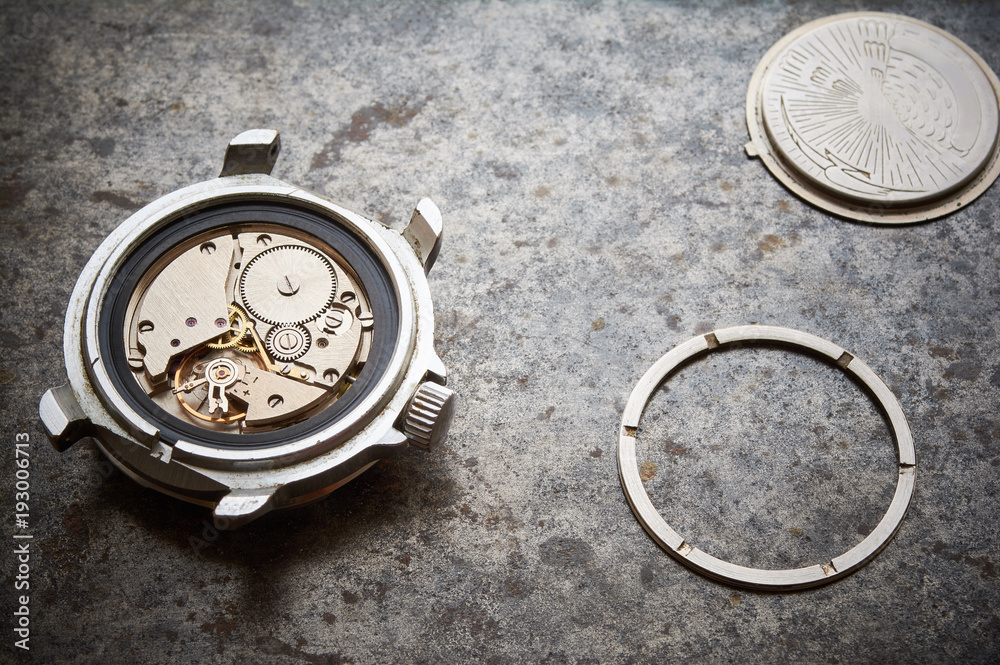 Old disassembled watch.