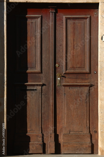 Wooden & metal door. Ancient doors in Prague, Czech. Texture, architecture, background, wallpaper.