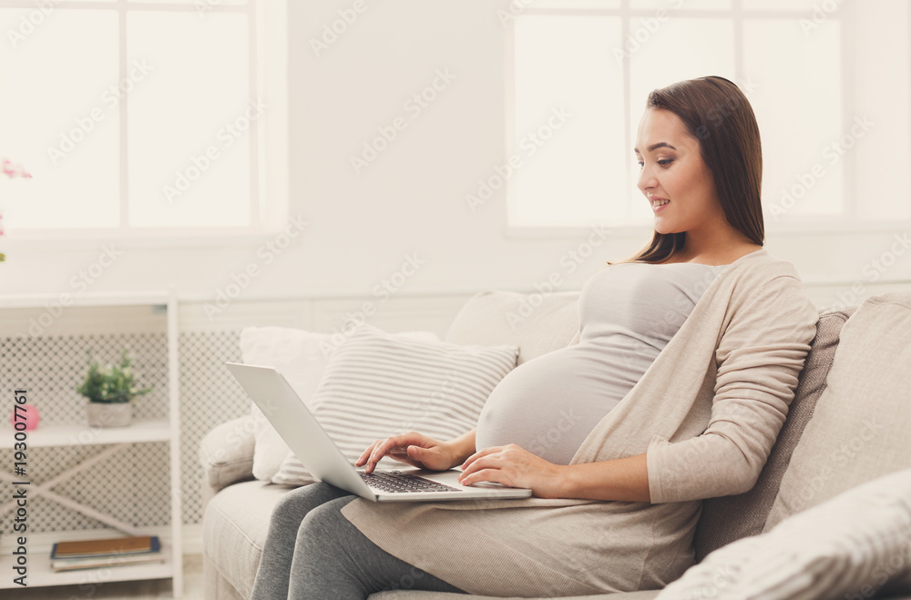 Pregnant business woman remote working at home Pregnant business woman remote working at home