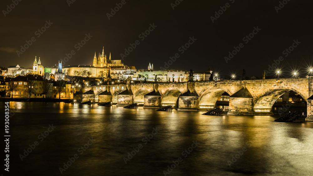Fototapeta premium Charles bridge reflected in the Vltava river