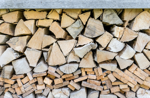 firewood   background with stacked firewood 