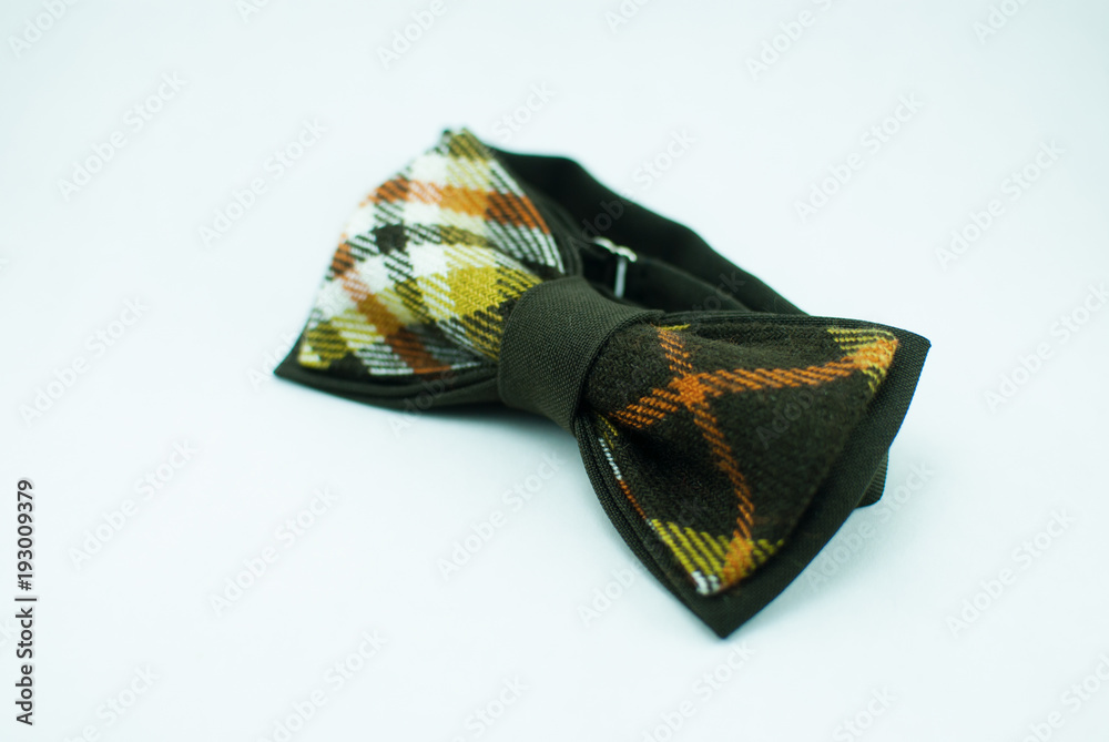 Well-designed stylish dark-green-yellow bow tie made of soft cloth Well-designed stylish dark-green-yellow bow tie made of soft cloth