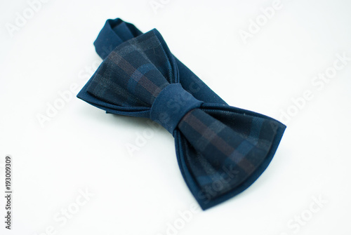 Well-designed stylish dark-blue bow tie made of soft cloth