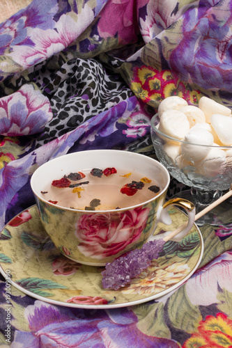 cup of tea with delicious merengue photo