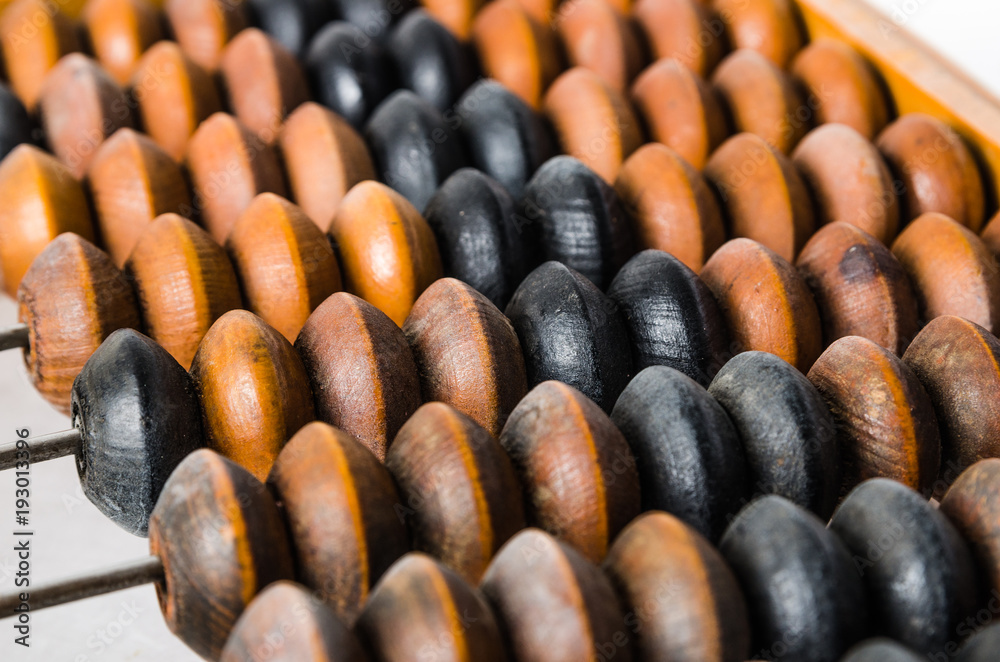 Old abacus, close-up isolated on white Old abacus, close-up isolated on white