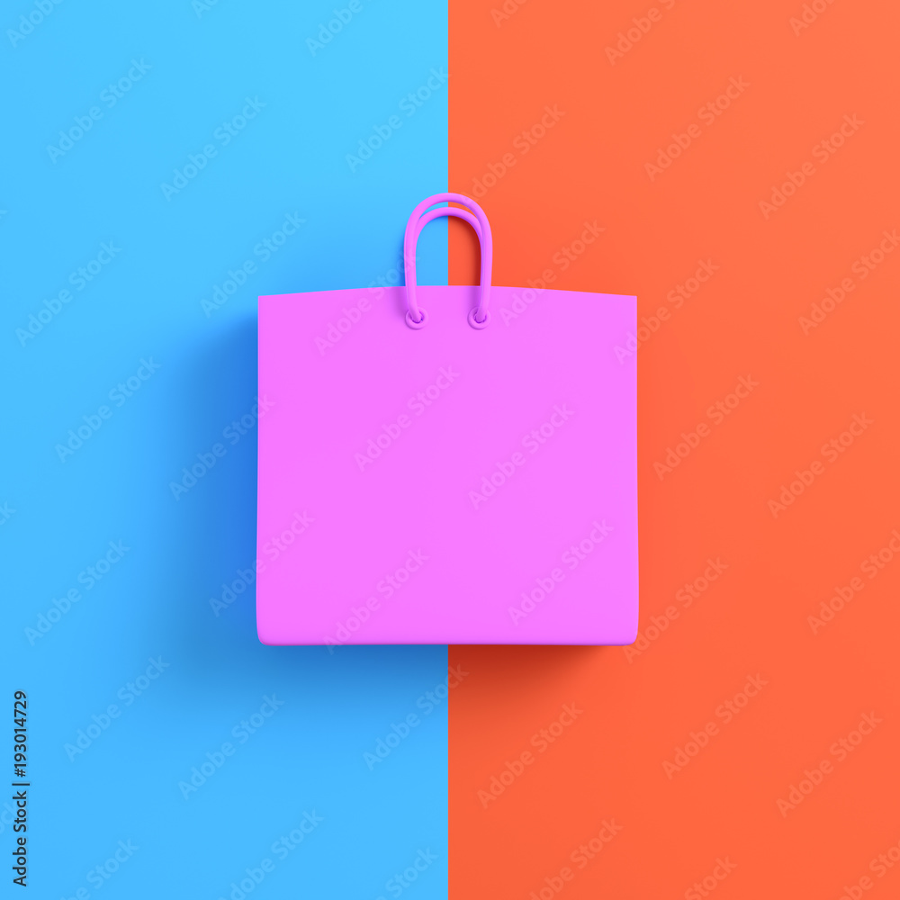 Pink shopping bag on bright blue orange background Pink shopping bag on bright blue orange background