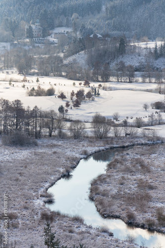 Tepla River in beautiful snowy winter landscape near Cihelny before Brezova dam, Karlovy Vary, Czech Republic, sunny day photo