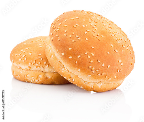 Two hamburger buns with sesame isolated on white background