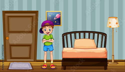 Happy boy standing in bedroom