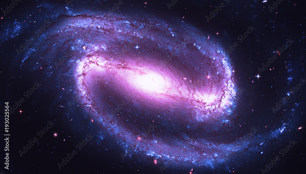 Fototapeta premium Zakratowana galaktyka spiralna w gwiazdozbiorze Erydana. NGC 1300. Elementy tego zdjęcia dostarczone przez NASA.