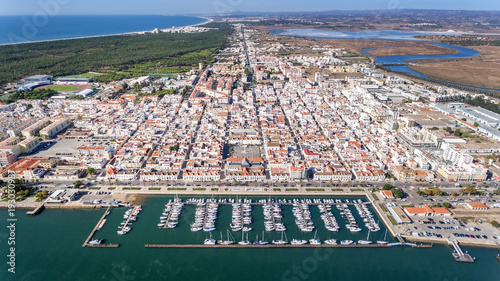 Aerial. Village VIla Real Sto Antonio on the river Guadiana, with a port for yachts and fishing boats. photo