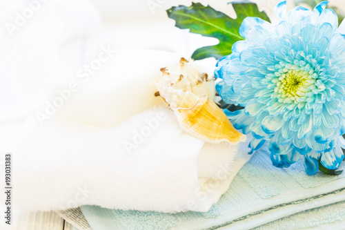 Spa concept with a blue flower