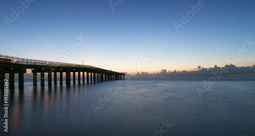 Sunrise on the beach , The sky takes on shades of orange during sunrise and sunset. Watch the sunrise. Watch the sunset. 