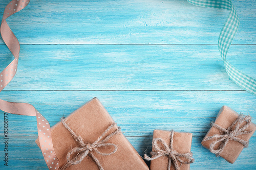 Gift box over wood with copy space, top view