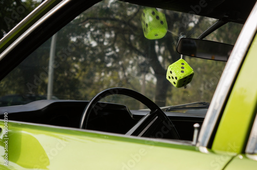 Dice hanging from mirror