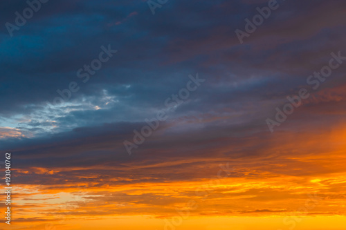 dramatic vibrant colorful clouds during sunset © dziewul