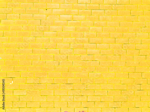 Old yellow brick wall background for spring or summer card or easter background