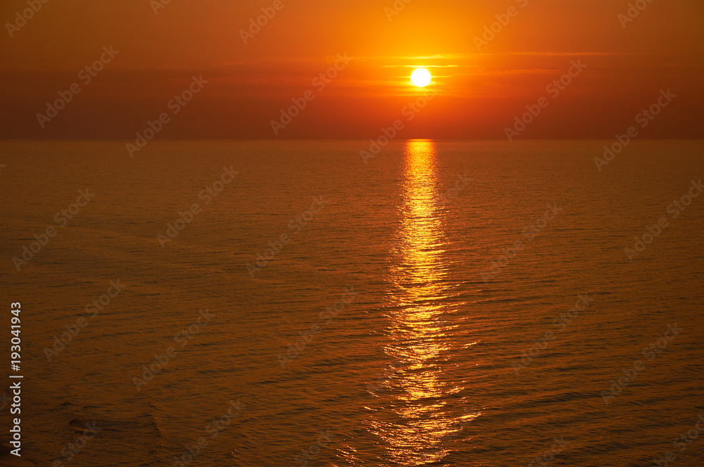 Risen sun above the sea