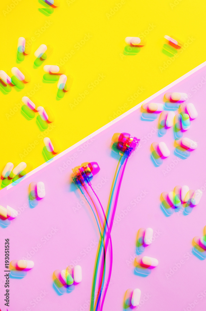 headphones. glitch. pills. minimalism. background of two colors