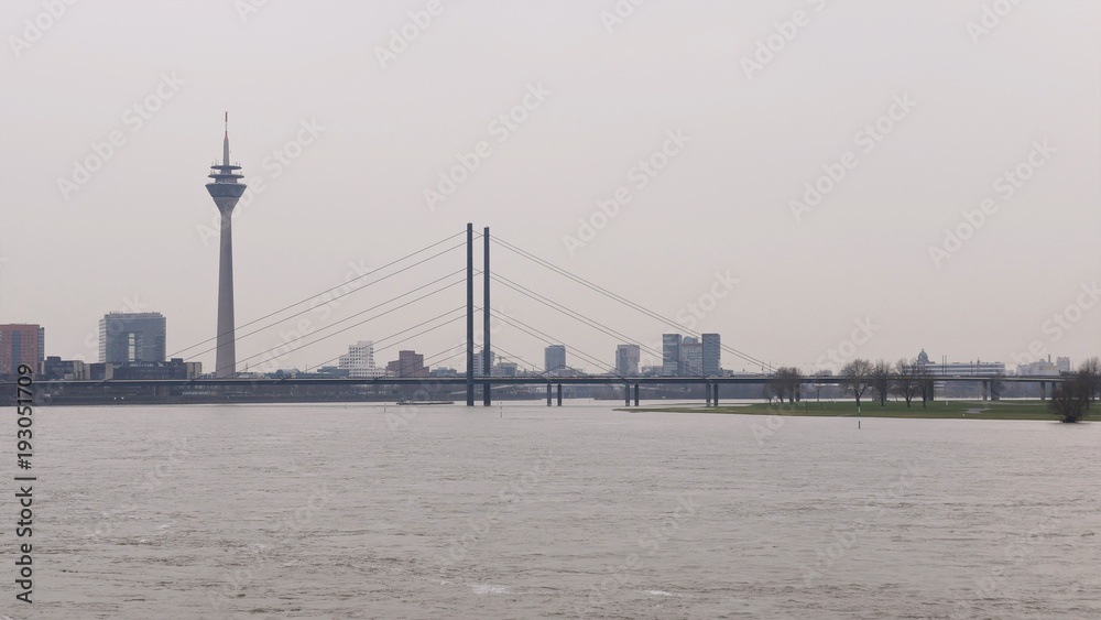 River Rhine at Dusseldorf Germany, Oberkassler bridge with a view of the skyline