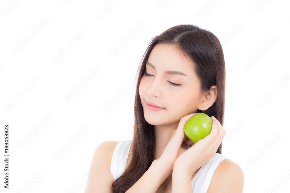 Beautiful young asian woman smile and holding green apple fruit with wellness and healthy isolated on white background. Beautiful young asian woman smile and holding green apple fruit with wellness and healthy isolated on white background.