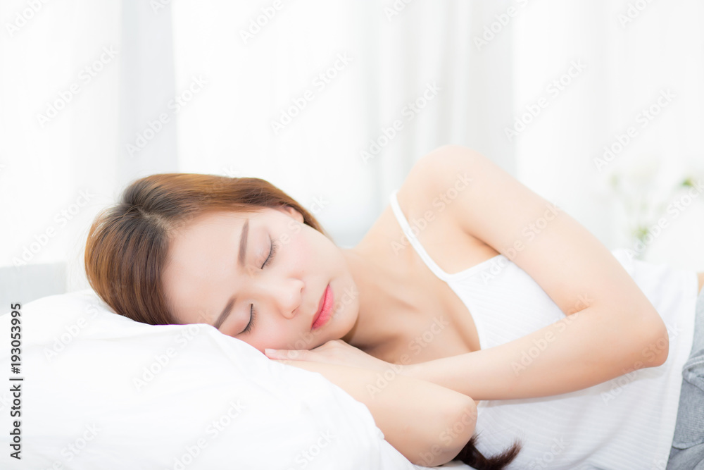 Beautiful asian young woman sleeping lying in bed with head on pillow comfortable and happy. girl with relax for health concept. Beautiful asian young woman sleeping lying in bed with head on pillow comfortable and happy. girl with relax for health concept.