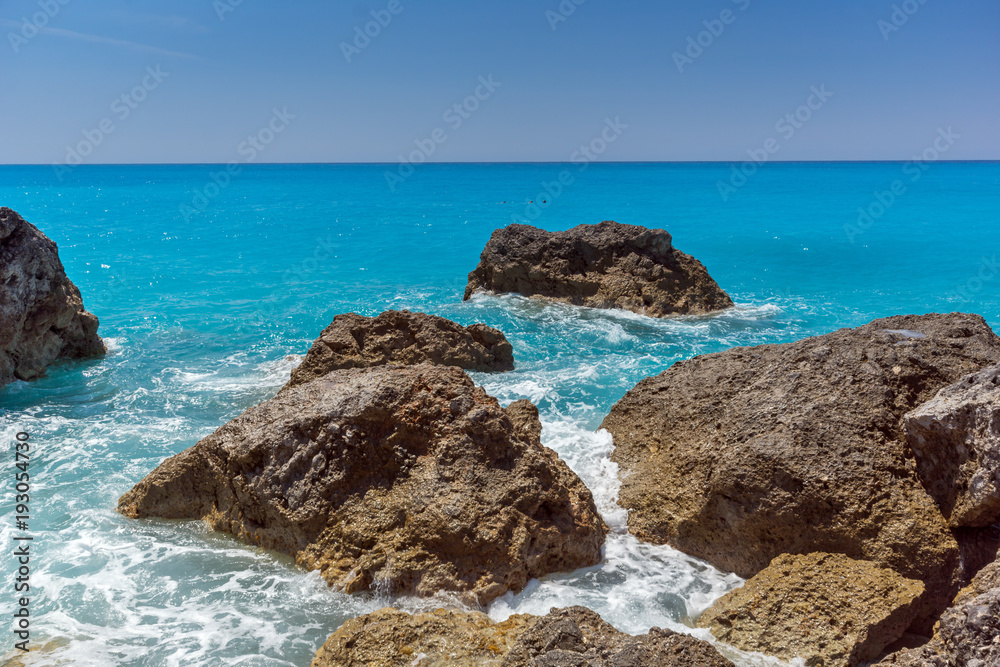 Amazing seascape of blue waters of Megali Petra Beach, Lefkada, Ionian Islands, Greece Amazing seascape of blue waters of Megali Petra Beach, Lefkada, Ionian Islands, Greece