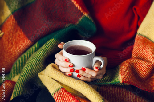 cup of hot coffee in the hands
