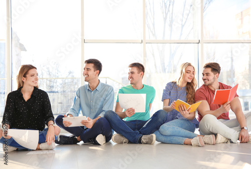 Group of young people indoo...
