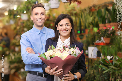Young people with flowers i...