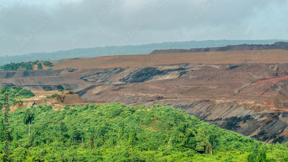 Unique landscape caused by open pit coal mining activity in Sangatta, Indonesia