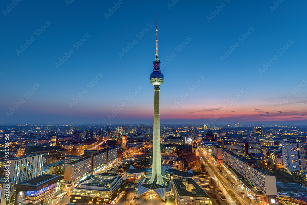 The skyline of Berlin with the famous television tower at dusk