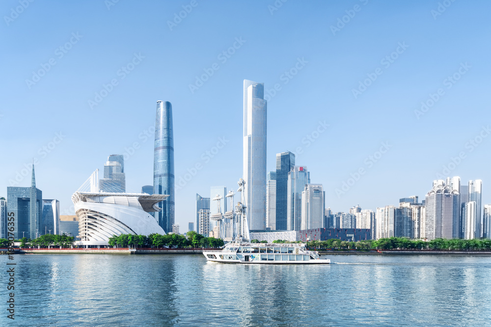 Tourist boat sailing along the Pearl River in Guangzhou, China Tourist boat sailing along the Pearl River in Guangzhou, China