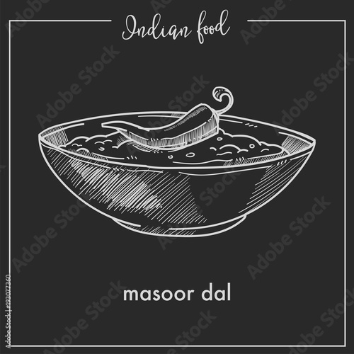 Masoor dal with chili pepper in bowl from Indian food