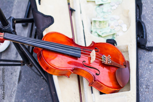 Violin in exchange for money