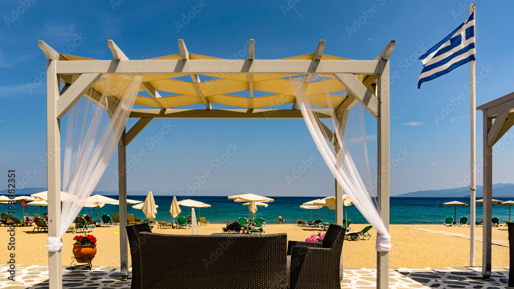 Sithonia peninsula of Greece Seascape With Beach Umbrellas And Sunbeds