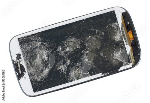 A broken screen of modern  phone. This device was wiped from a pneumatic gun. photo